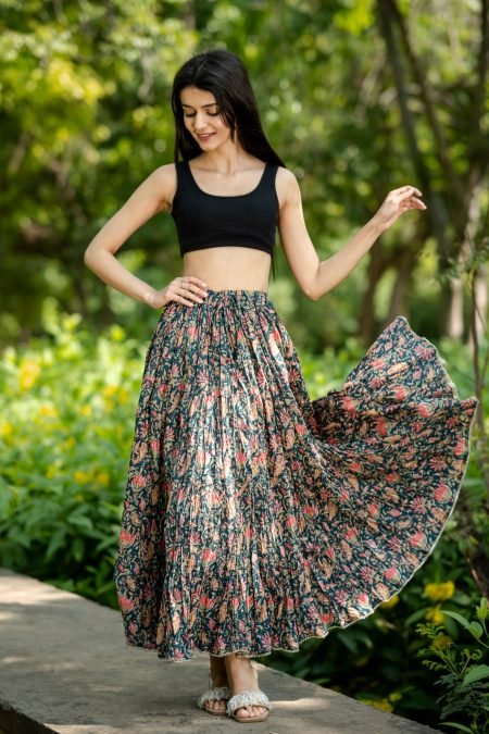 Woman twirling in a floral hand-screen printed tiered cotton maxi skirt — Skirts